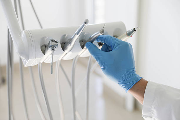 Professional Tooth Extraction technician working in Lynnville, IN